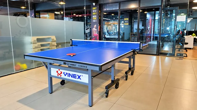Fitness9 Karkhana — table tennis area beside the training floor